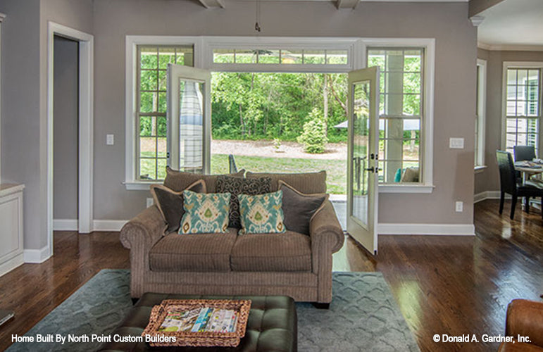 Double patio doors open in the great room leading to the patio. The Weatherford plan 1053.