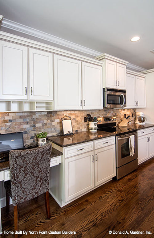 Study desk in the kitchen. The Weatherford plan 1053.