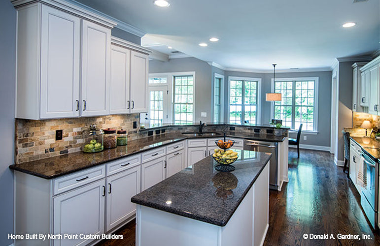 Kitchen view to the breakfast nook. The Weatherford plan 1053.