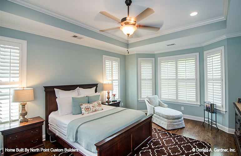 Tray ceiling and ceiling fan in the master bedroom. The Weatherford plan 1053.