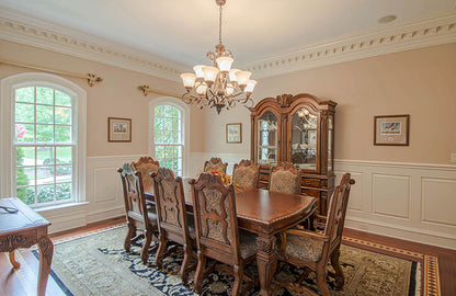 Wainscotting and molding along the ceiling in the dining room. The Wedgewood plan 806.