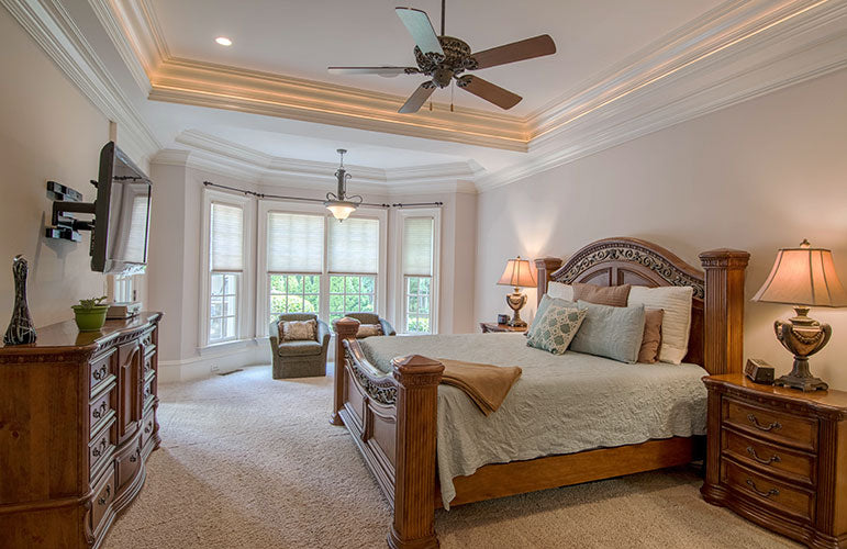 Tray ceiling with ceiling fan in the master bedroom. The Wedgewood plan 806.