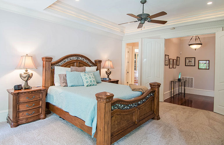 Carpet and recessed lights in the master bedroom. The Wedgewood plan 806.