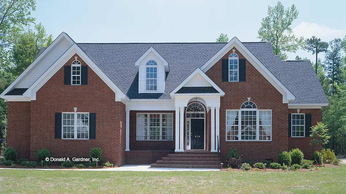 This is a photograph of the front of brick house plan 522 The Wentworth as built by a customer