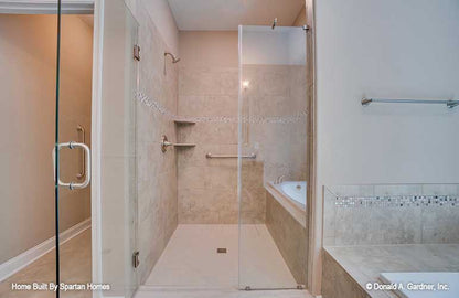 Tiled walk-in shower in the master bathroom. The Westlake plan 1332.