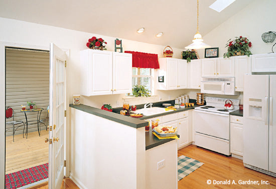 White cabinets in the kitchen. The Westport plan 389.