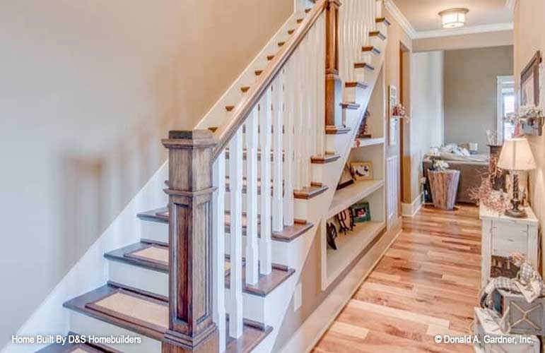 Distressed look on the railing of the staircase. The Wexler plan 1248.