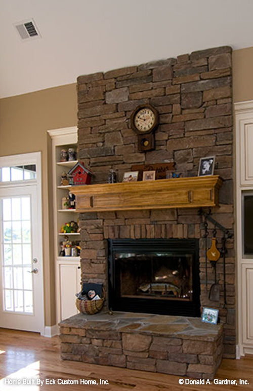 Stone fireplace in the Great room.  The Whitcomb plan 1218.