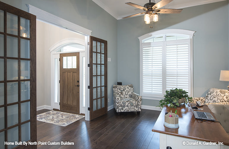 View from the open French doors to the foyer. The Wilkerson plan 1296.