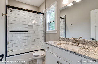 Single sink vanity and shower/ tub in the bathroom. The Williamette plan 1203.