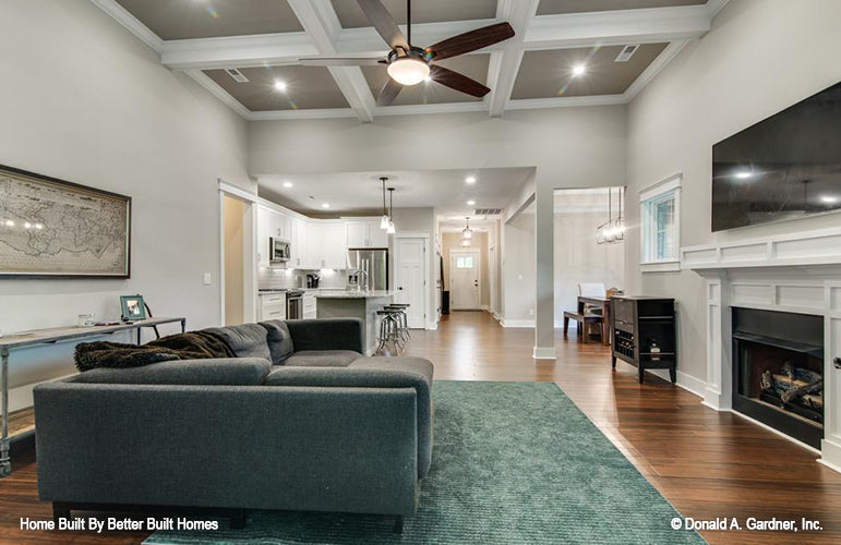 Coffered ceiling and ceiling fan in the great room. The Williamette plan 1203.