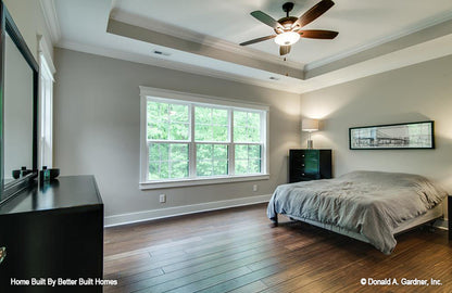 Tray ceiling and ceiling fan in the master bedroom. The Williamette plan 1203.