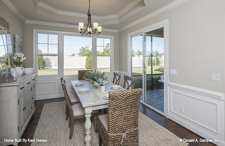 Tray ceiling and crown molding in the dining room. The Wilton plan 981.