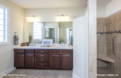 Double sink vanity next to the walk-in shower in the master bathroom. The Wilton plan 981.