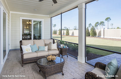 Seating area in the screened in porch. The Wilton plan 981.