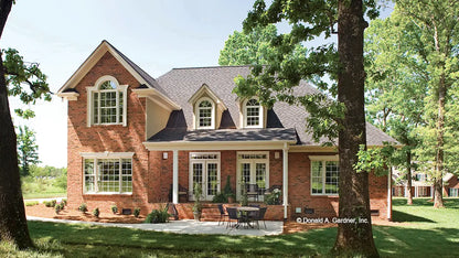 Front view photograph of a brick covered porch. The Winslow plan 903.