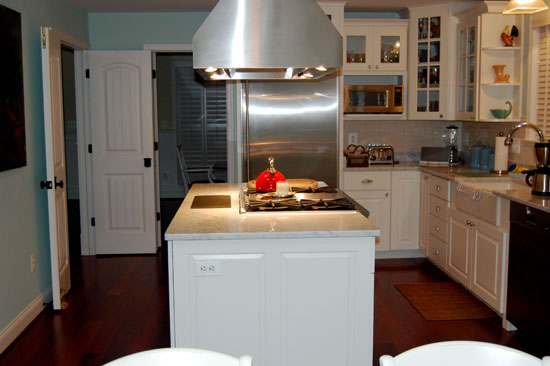 Stove top on the island in the kitchen. The Woodland plan 256.