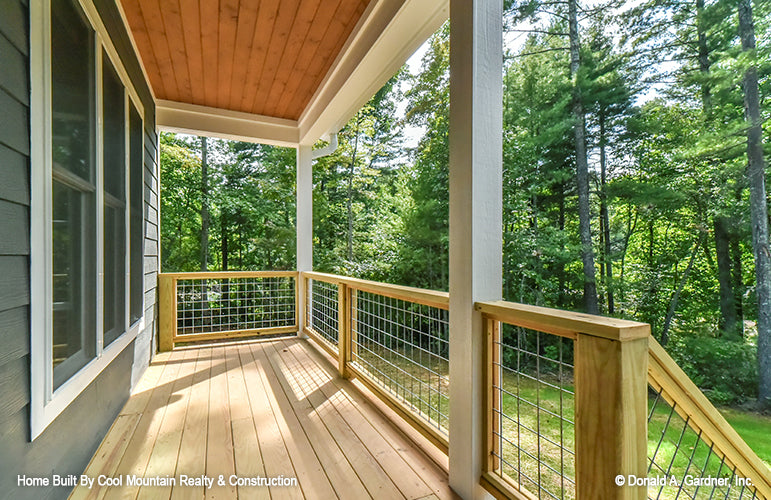 Stain wood ceiling on the front porch. The Wycliff plan