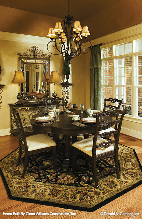 Tray ceiling and chandelier in the dining room. The Yankton plan 933.