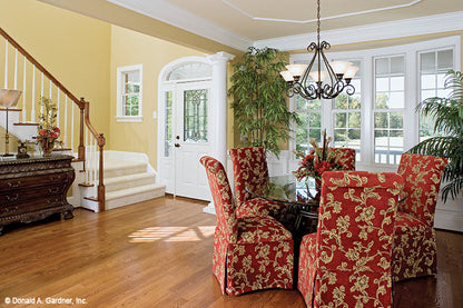 Crown molding along the ceiling in the dining room. The Yarborough plan 964.