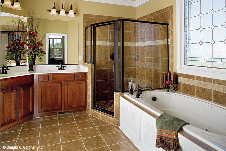 Walk-in shower next to the soaking tub. The Yarborough plan 964.