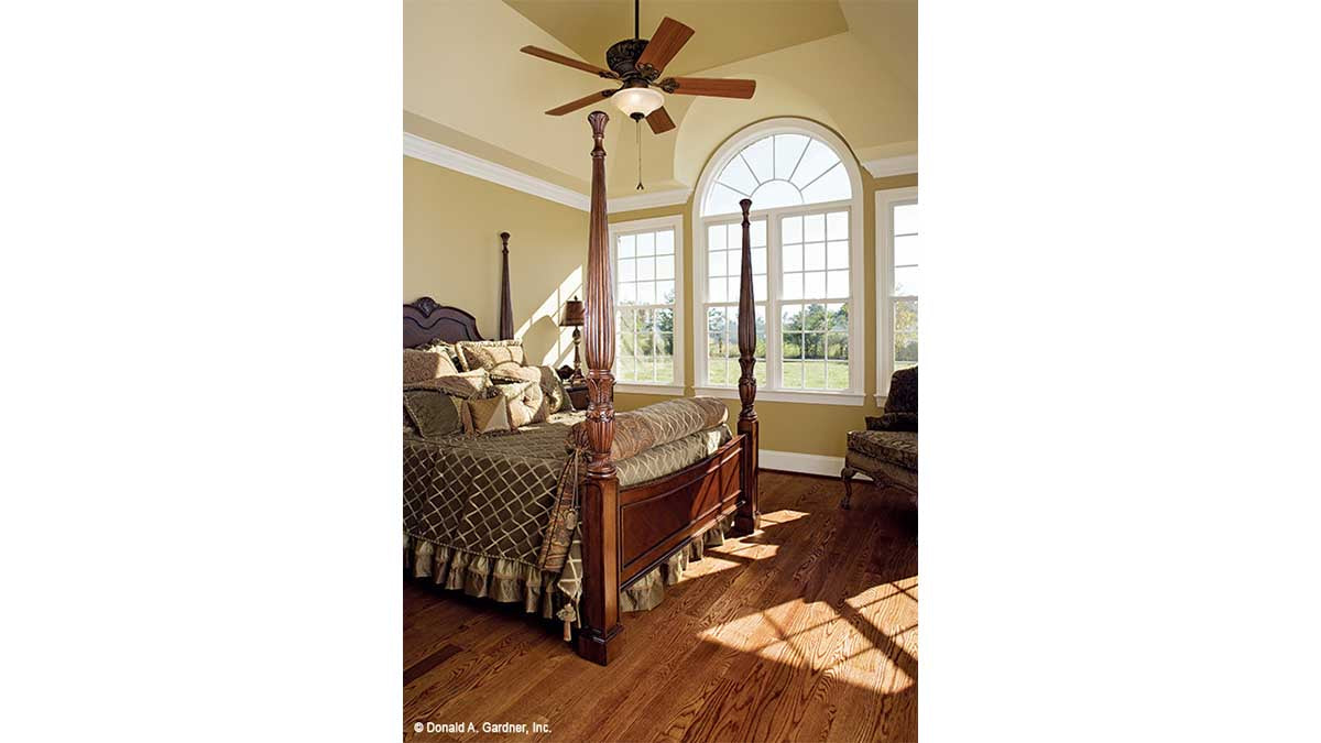 Tray ceiling and large windows in the master bedroom. The Yarborough plan 964.