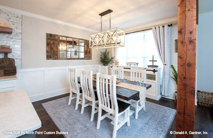 Crown molding along the ceiling in the dining room. The Zander plan 1478.