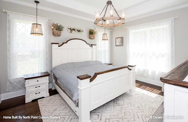 Tray ceiling and chandelier in the master bedroom. The Zander plan 1478.