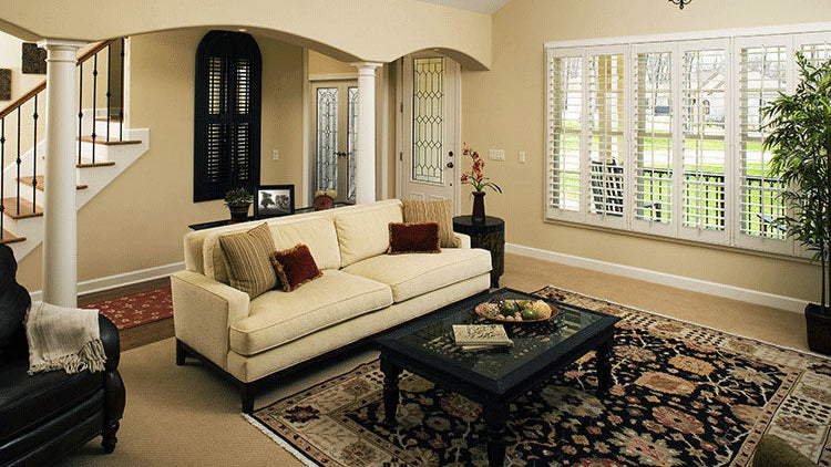 Arched entryways from the foyer to the great room. The Zeller plan 1014.