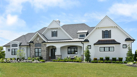 This is a photograph of the front of European Luxury house plan 1378 The Roseburg as built by a customer