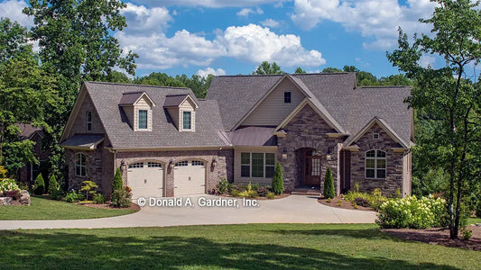 This is a photograph of the front of Craftsman Walkout Basement house plan 1254 The Silvergate as built by a customer