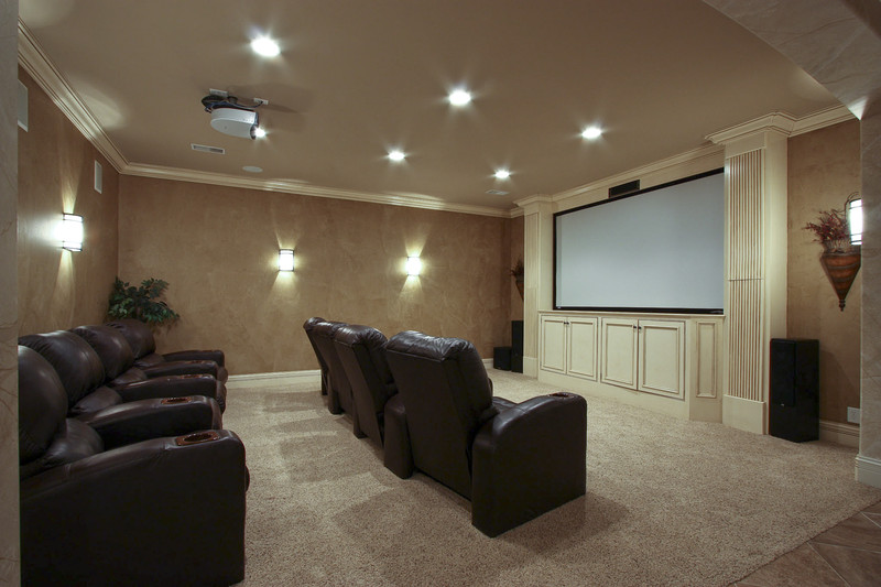 Home theater of The Hollingbourne house plan 990. 